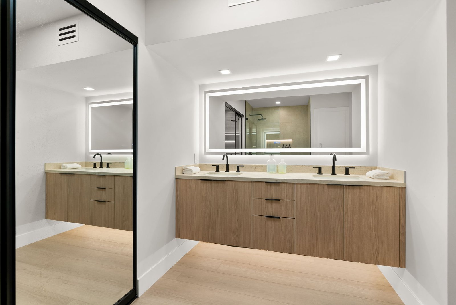 Custom cabinets installed in this bathroom for a bright and modern look.