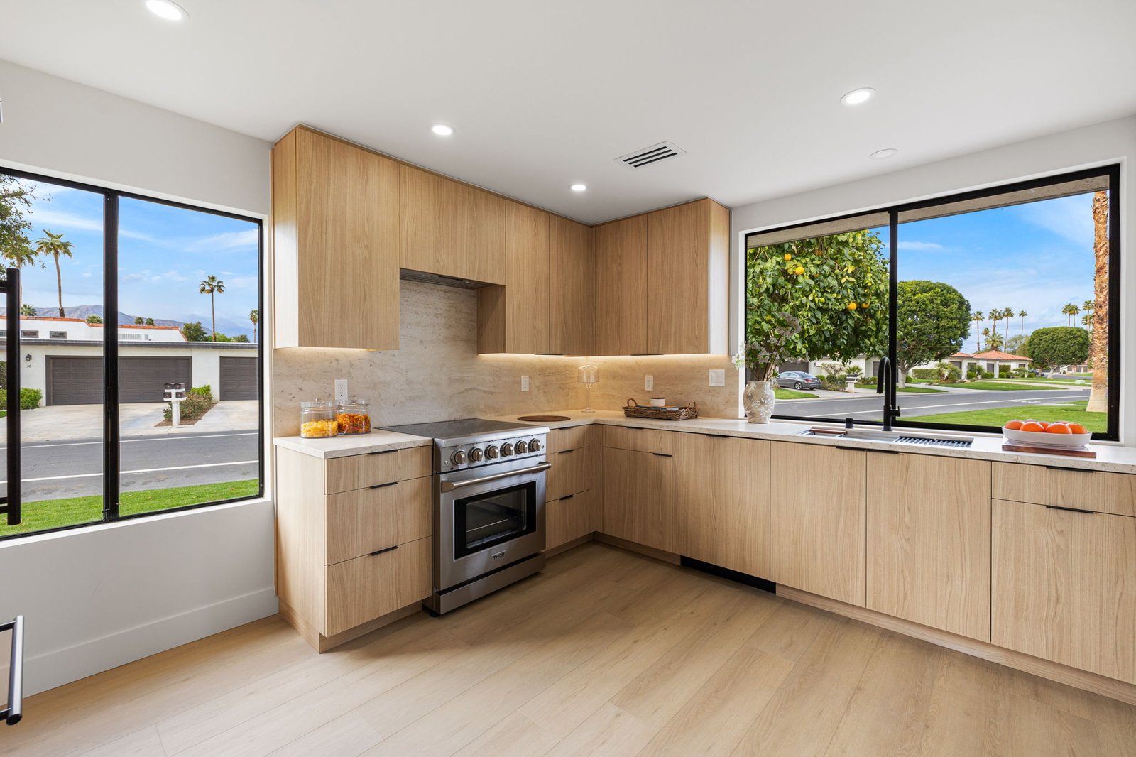 Premium custom cabinets by Laval enhance the color profile of this dream kitchen.