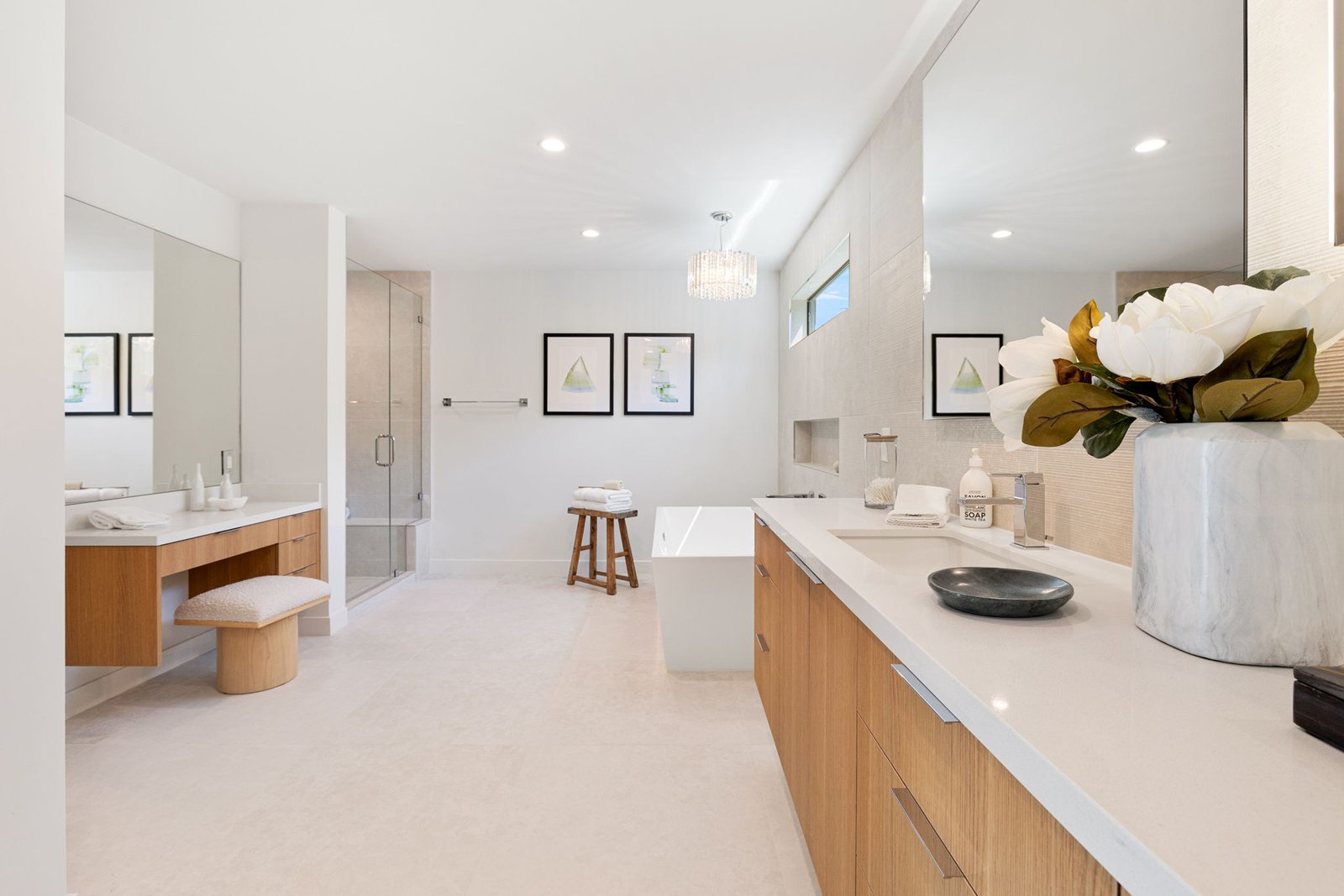 Laval's premium custom cabinets bring warm life to this modern and minimalistic bathroom.