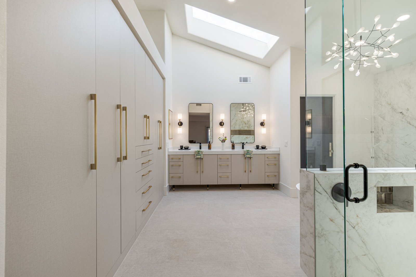 Custom cabinetry and creative storage solutions made with precision for this bathroom.