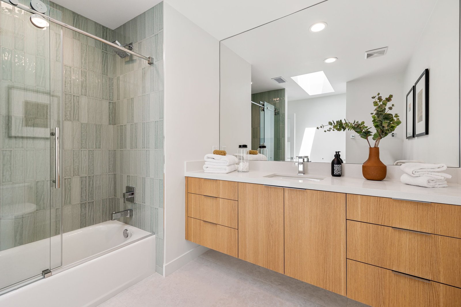 Custom cabinets installed in this bathroom for a bright and modern look.